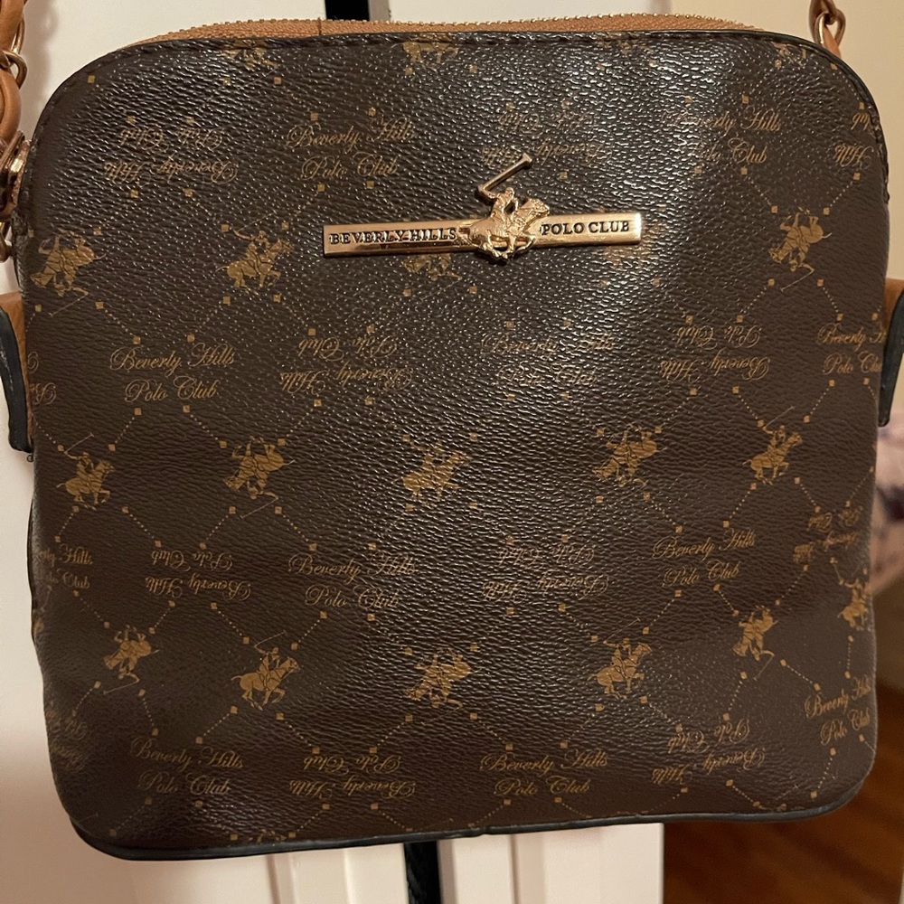 Brown color polo handbag